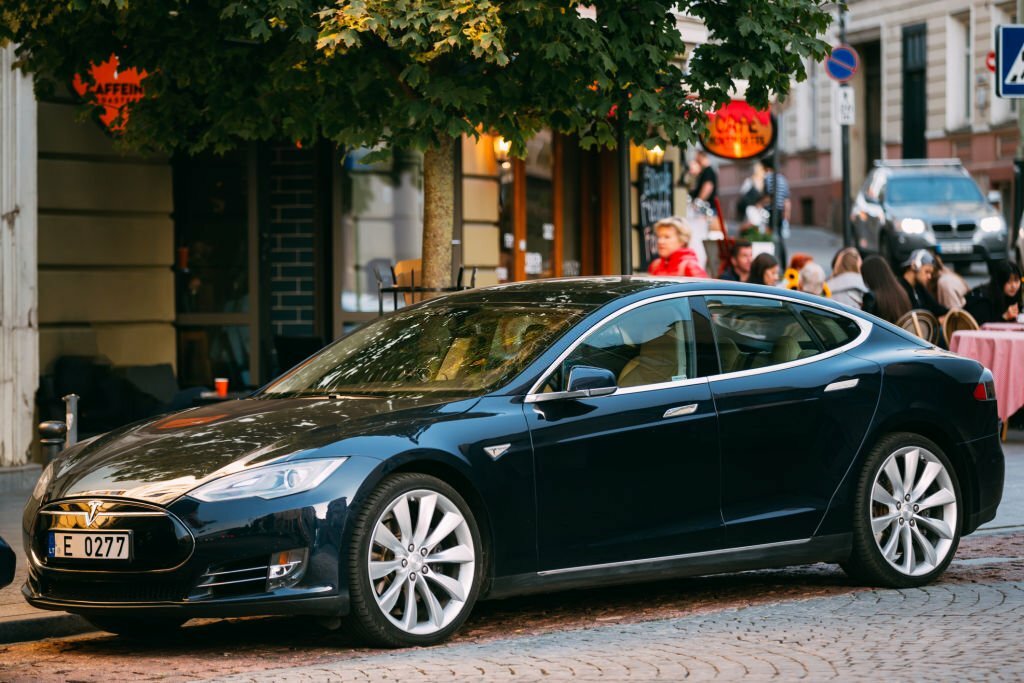 Vilnius, Lithuania - September 29, 2017: Tesla Model S Car In Motion On Street. The Tesla Model S Is A Full-sized All-electric Five-door, Luxury Liftback, Produced By Tesla Inc.